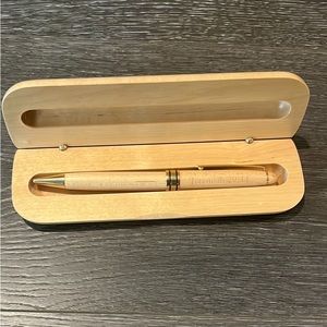 Wooden pen in wooden case